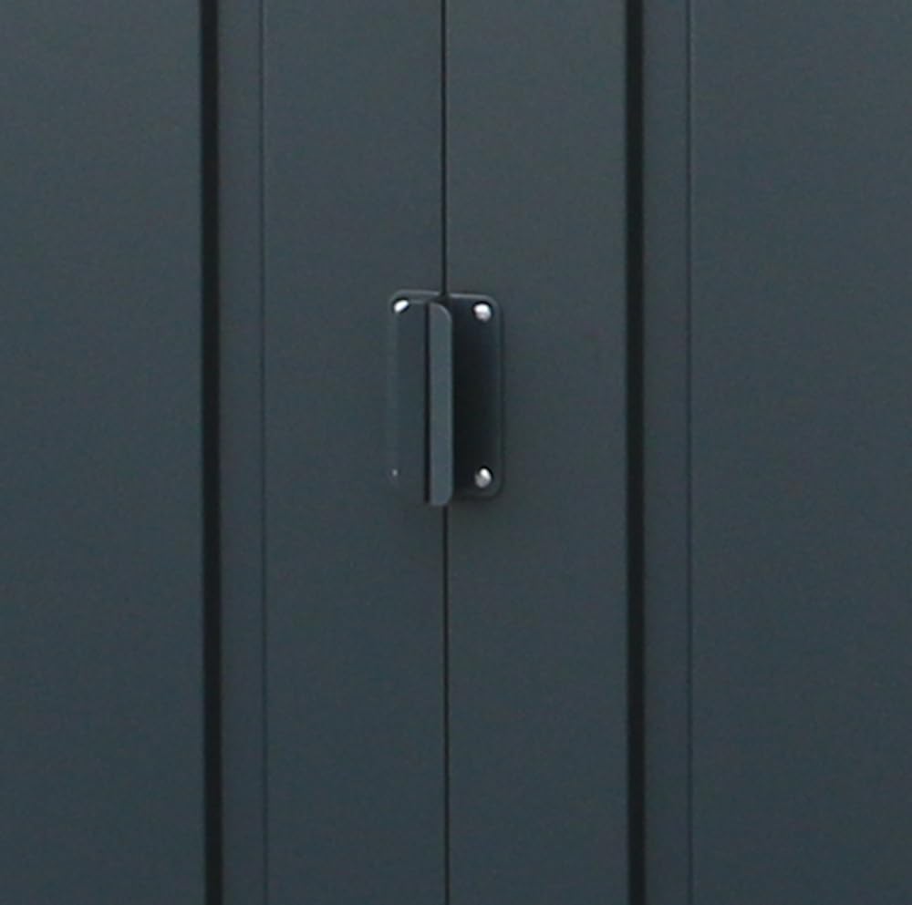 Head-on view of the shed showing closed double sliding doors, white trim and the raised entry threshold