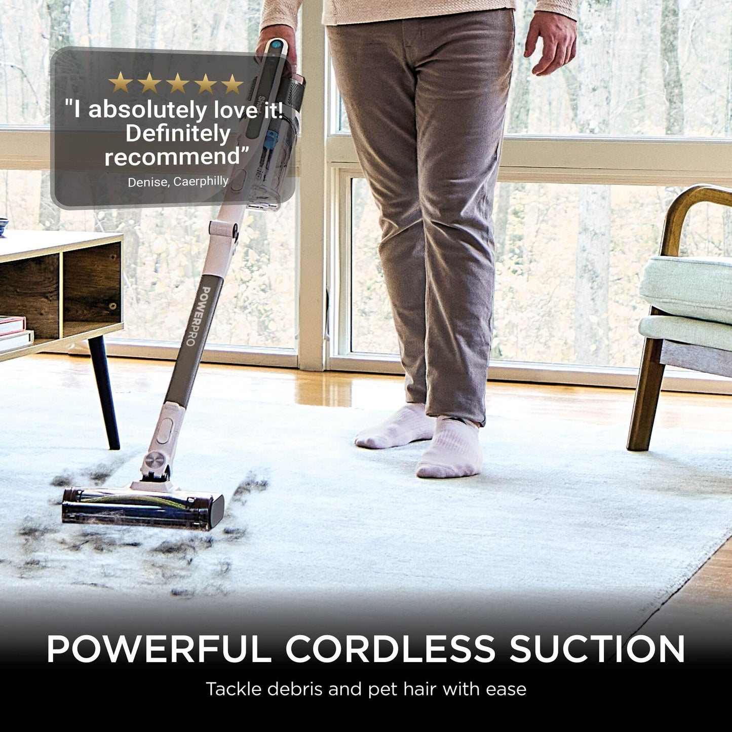 Person using the Shark stick on a rug with a five‑star customer review overlay saying “I absolutely love it! Definitely re…