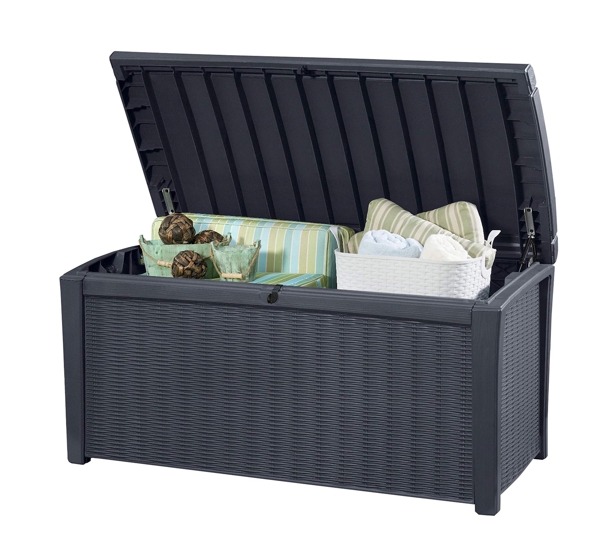 Raised lid of storage box revealing cushions, baskets and piston-assisted hinges